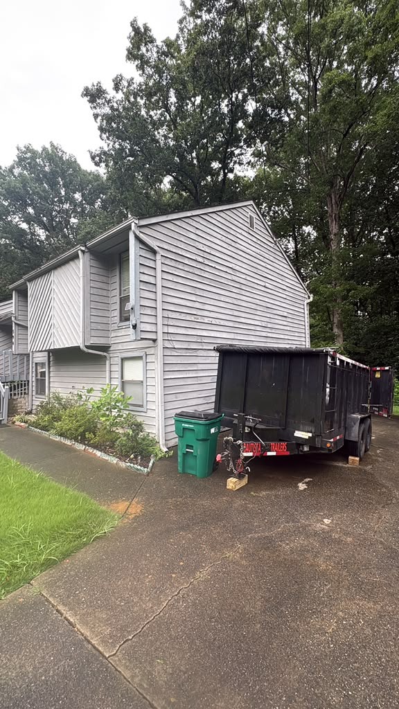 Dump trailer parked in home driveway